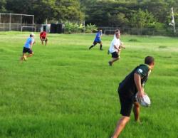 The USVI Rugby teams warms up for practice.